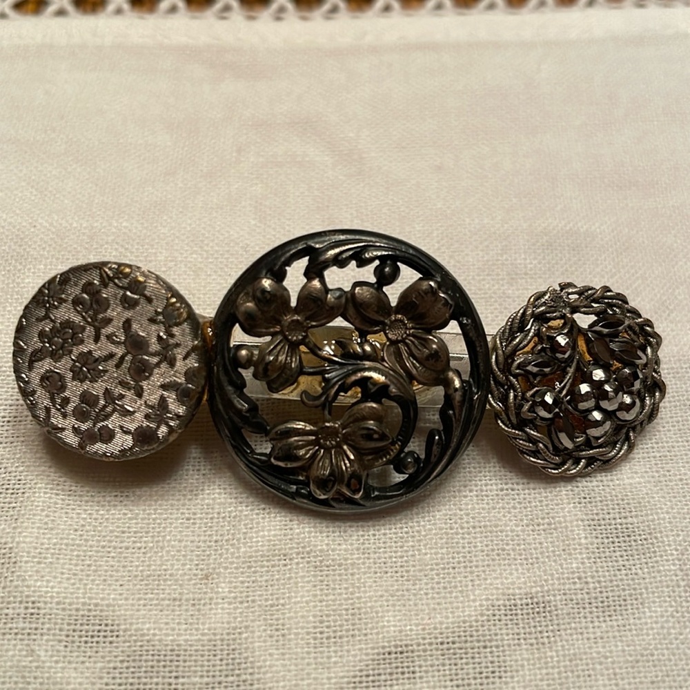 Antique pewter button brooch